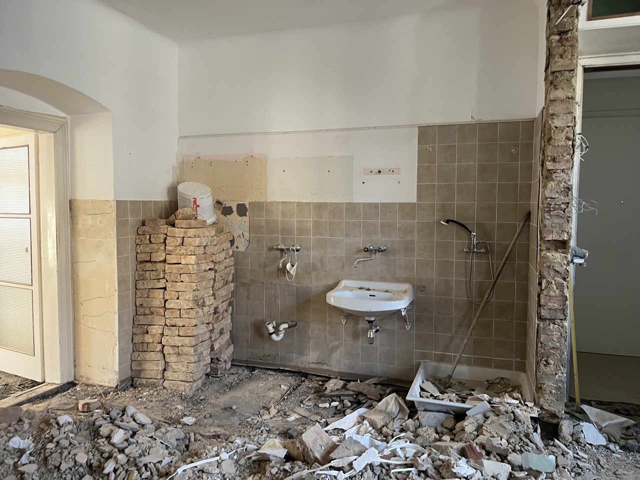 The bathroom stripped back to brick during the works